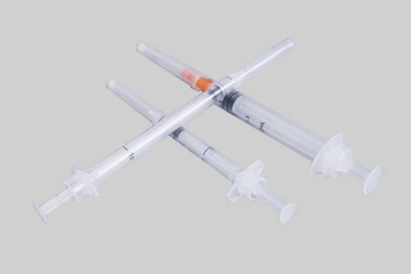 Fixed dose vaccine injector