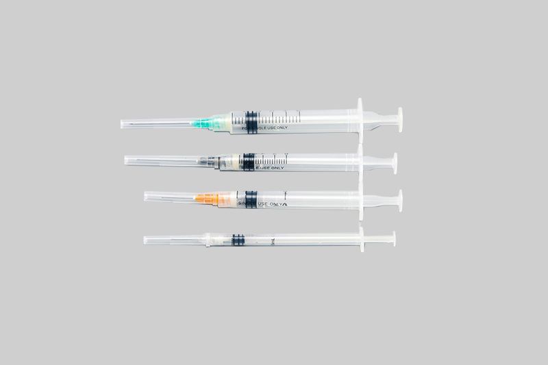 Retractable self destruct syringe